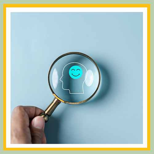 Image of a magnifying glass over the mind